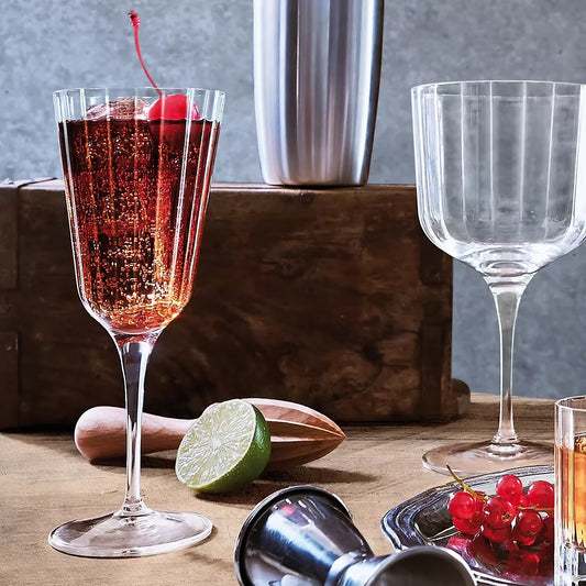 Vintage cocktail glasses set with stemmed design and cocktail.
