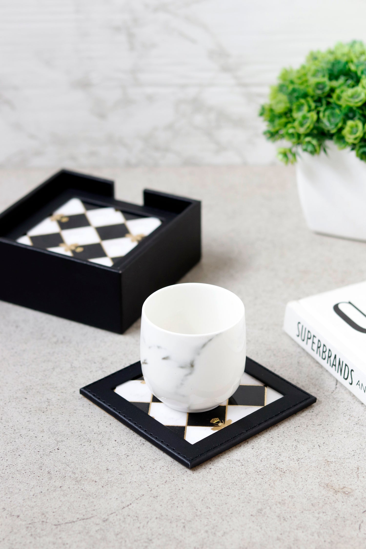 Checkered coasters set with bumblebee accent and black frame.