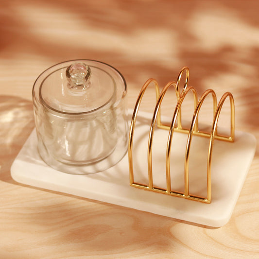Breakfast tray with toast rack and glass jar.