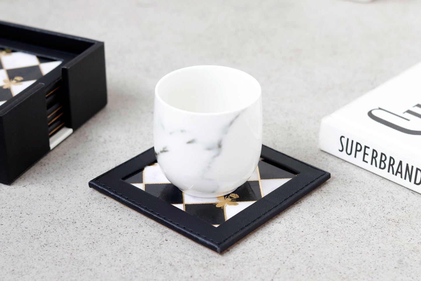 Bumblebee coaster with checkered design and black frame.