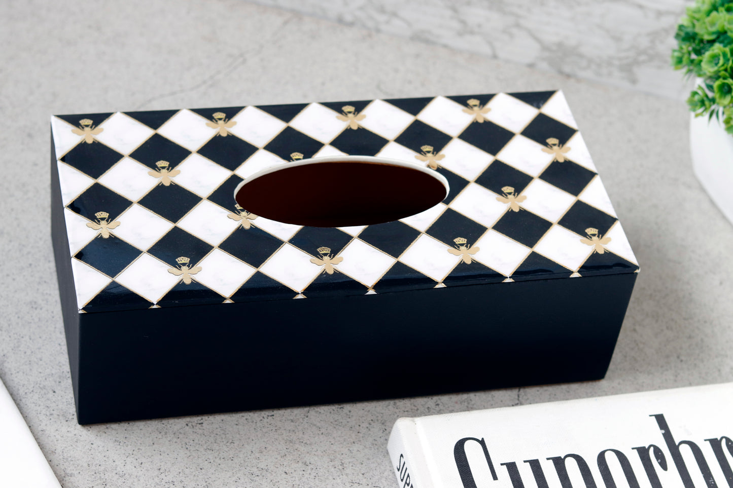 Bumblebee tissue holder featuring checkered pattern and bee details.