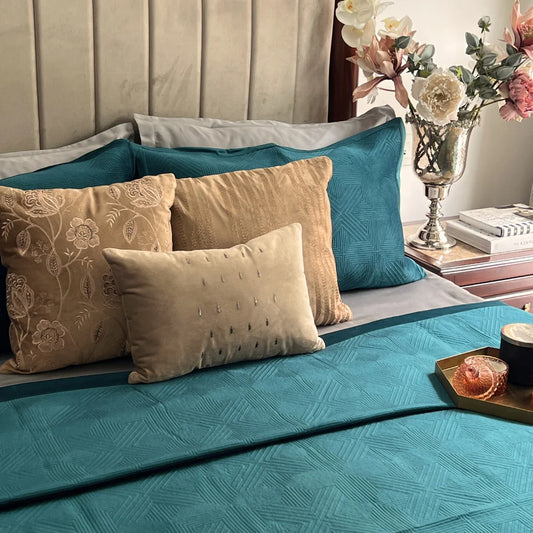 Emerald Green velvet bedspread with geometric pattern.
