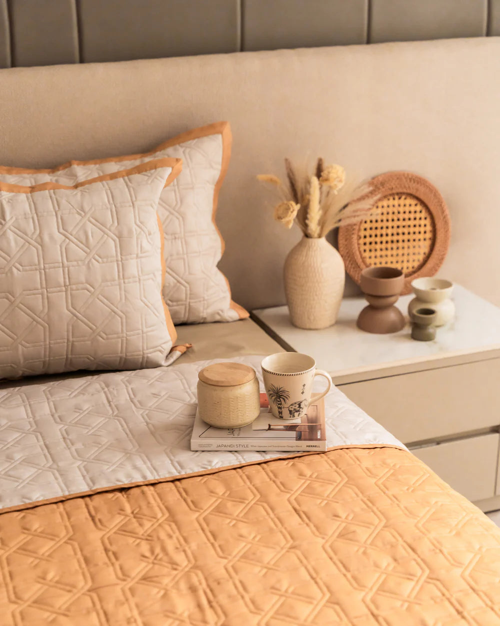 Quilted bedspread in ivory and honey mustard color reversible design.