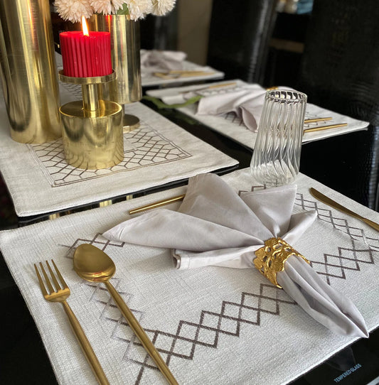 Elegant grey napkin & placemat set with zigzag design for table decor.
