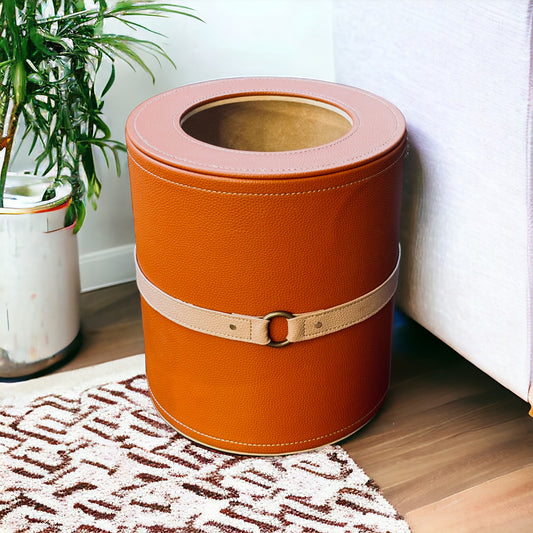 Cognac Luxora wastebin featuring decorative buckle belt.
