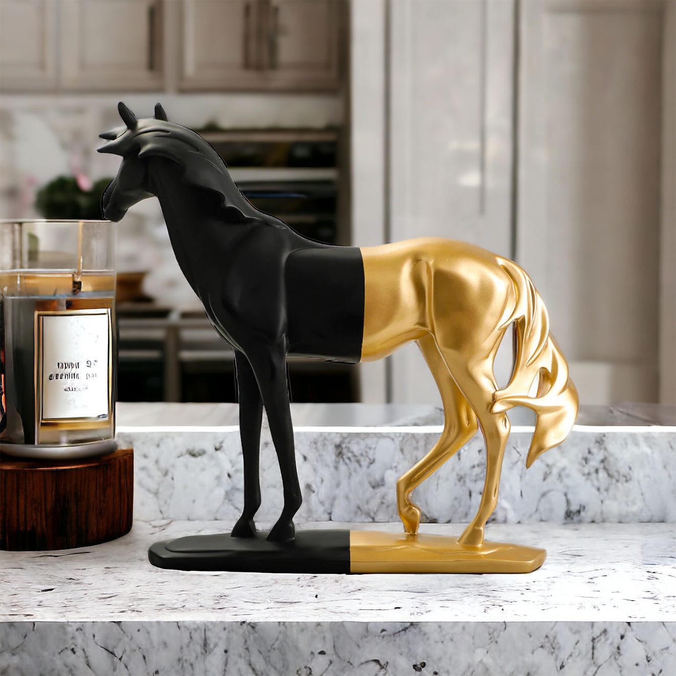 Black and gold finish horse sculpture for home decor.