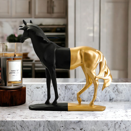 Black and gold finish horse sculpture for home decor.