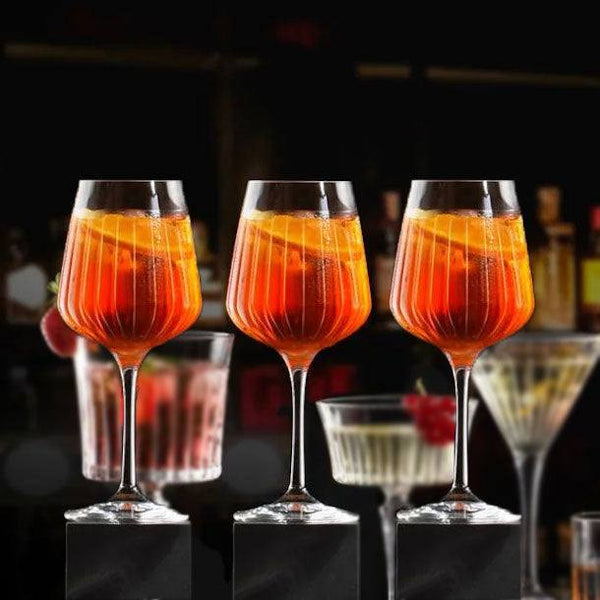 Elegant spritz glasses with ribbed design, ideal for cocktails, set of six.