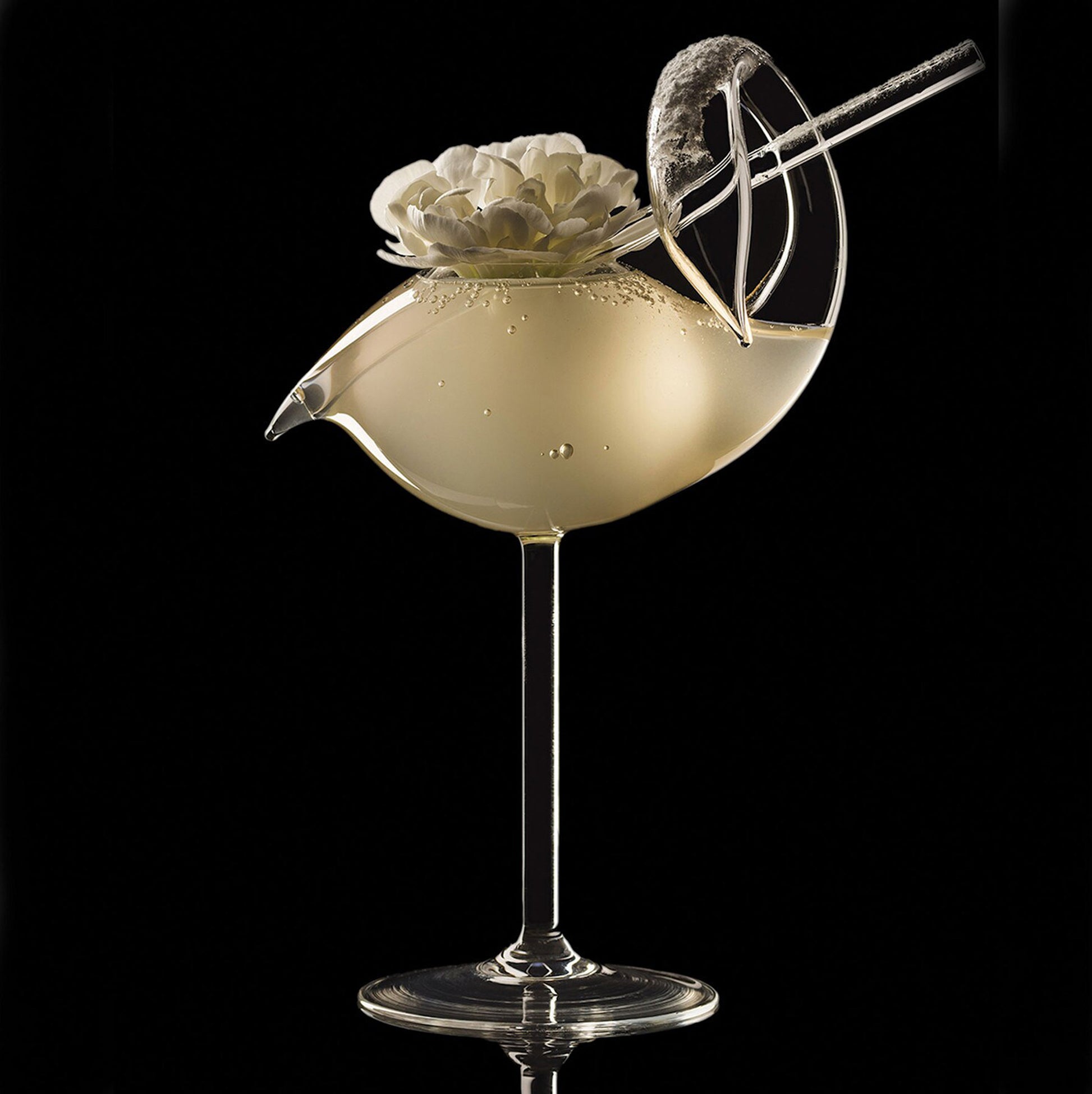 Elegant swan cocktail glass with a flower detail. Unique stemware.
