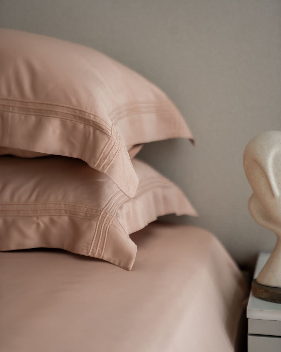 Creme bamboo bedsheet folded showing fabric texture
