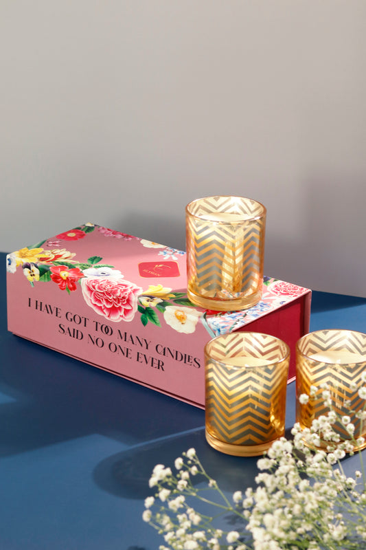 Mehnaaz candle set with gold chevron pattern and floral box.