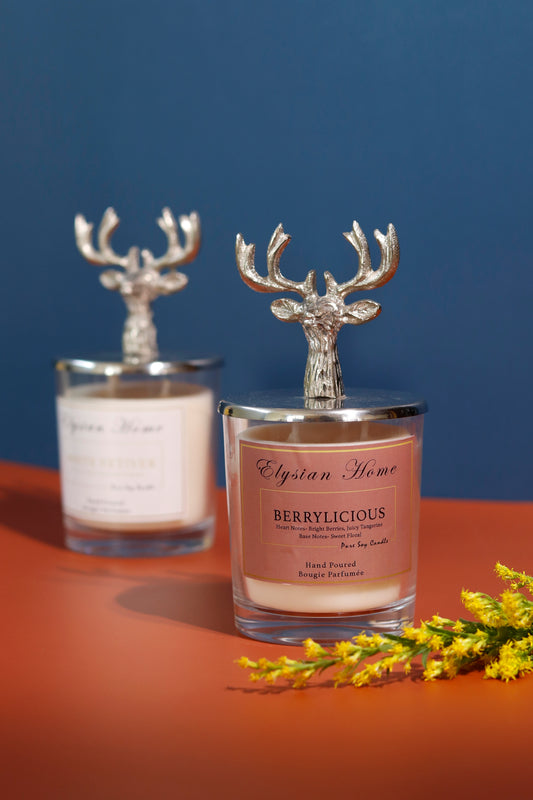 Reindeer candle set with silver reindeer head and "Berrylicious" scent.