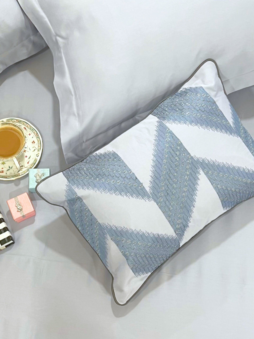 Stacy smoke blue bedsheet folded showing fabric detail