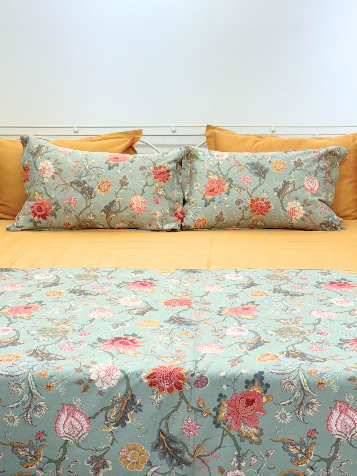 Close-up of half print half solid bedsheet detail