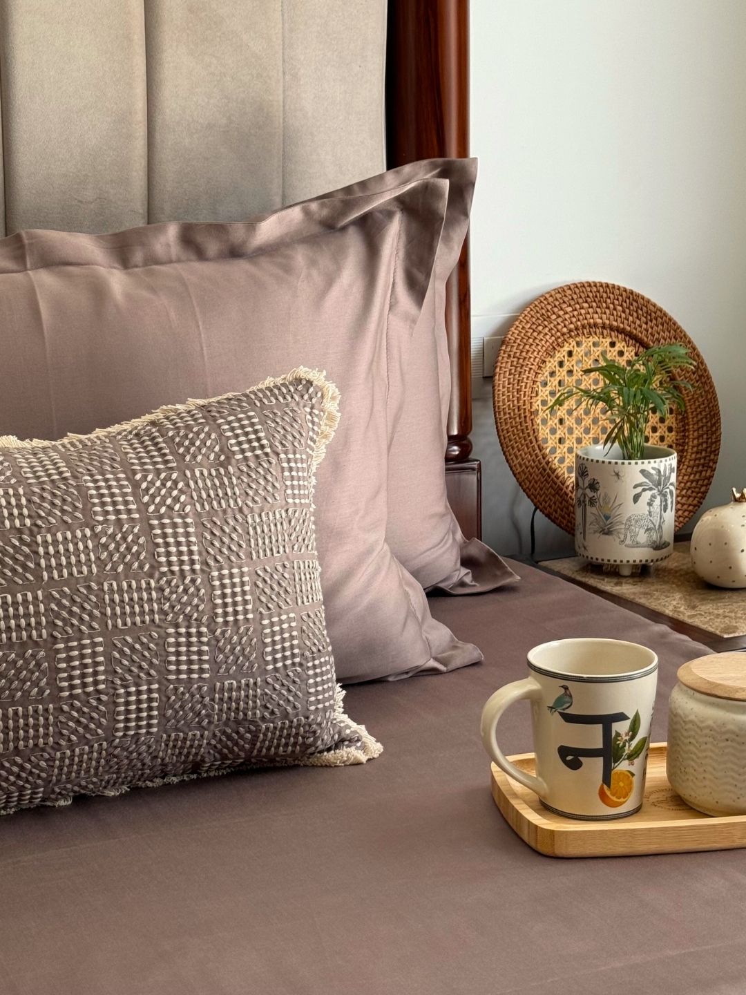 Embroidered accent cushion cover in taupe
