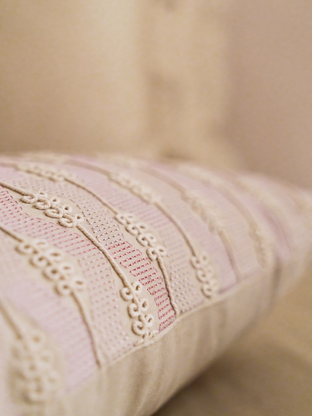 Bedroom scene with beige bedsheet set