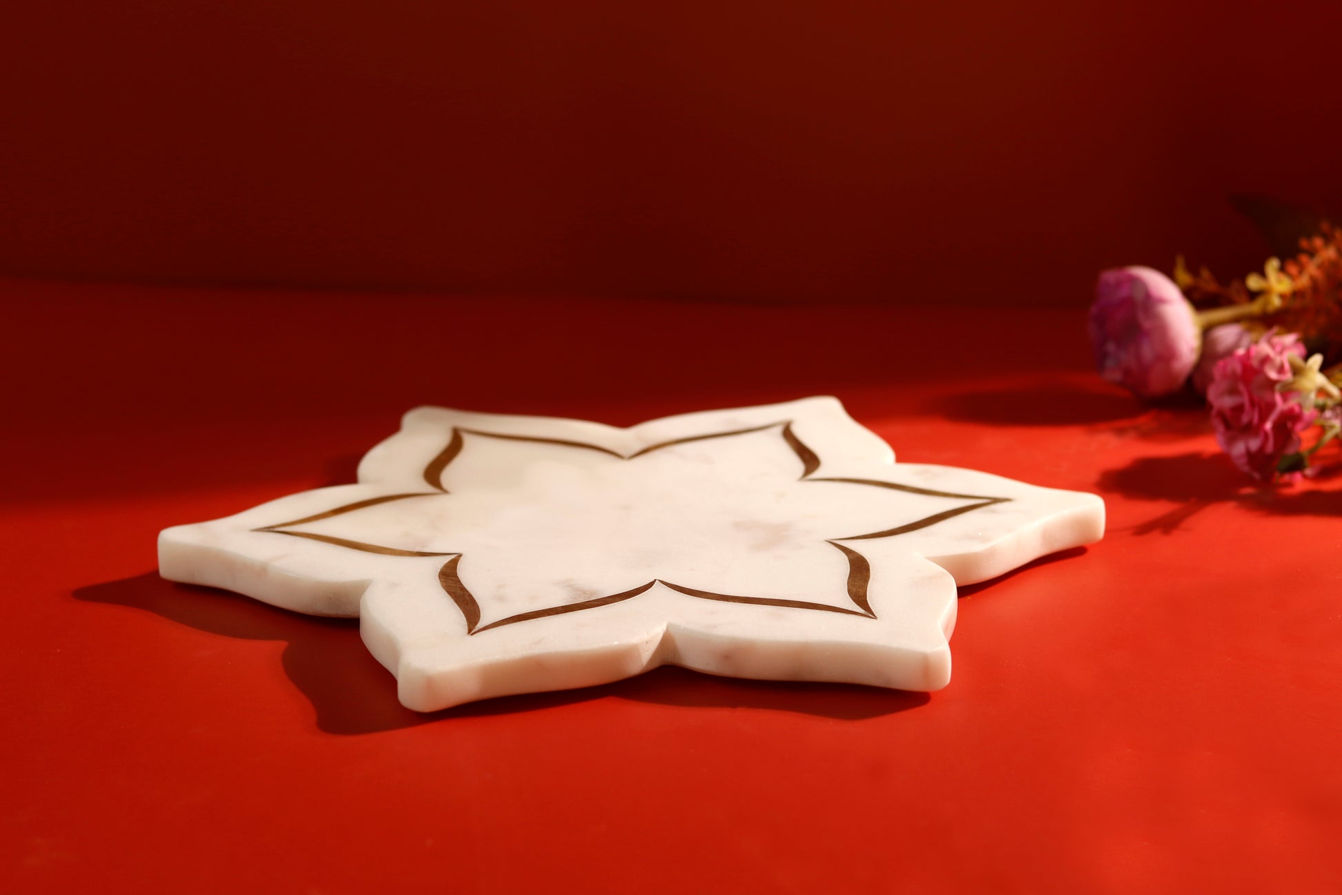 Elegant lotus platter featuring brass inlay design.