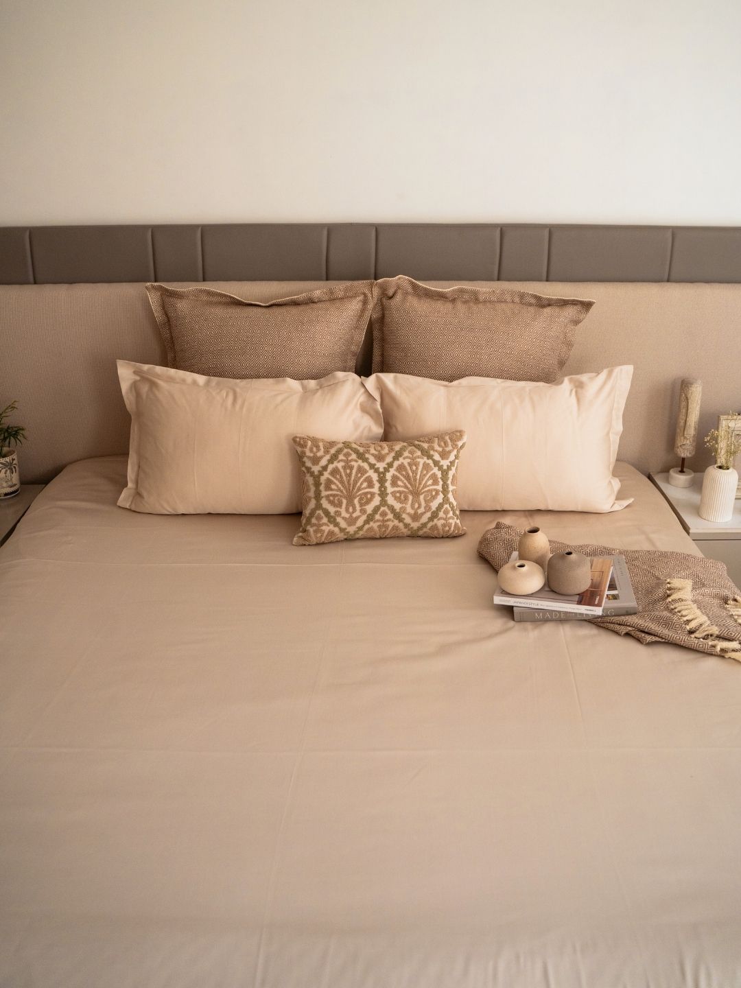 Full bed styled with oats beige bedsheet set