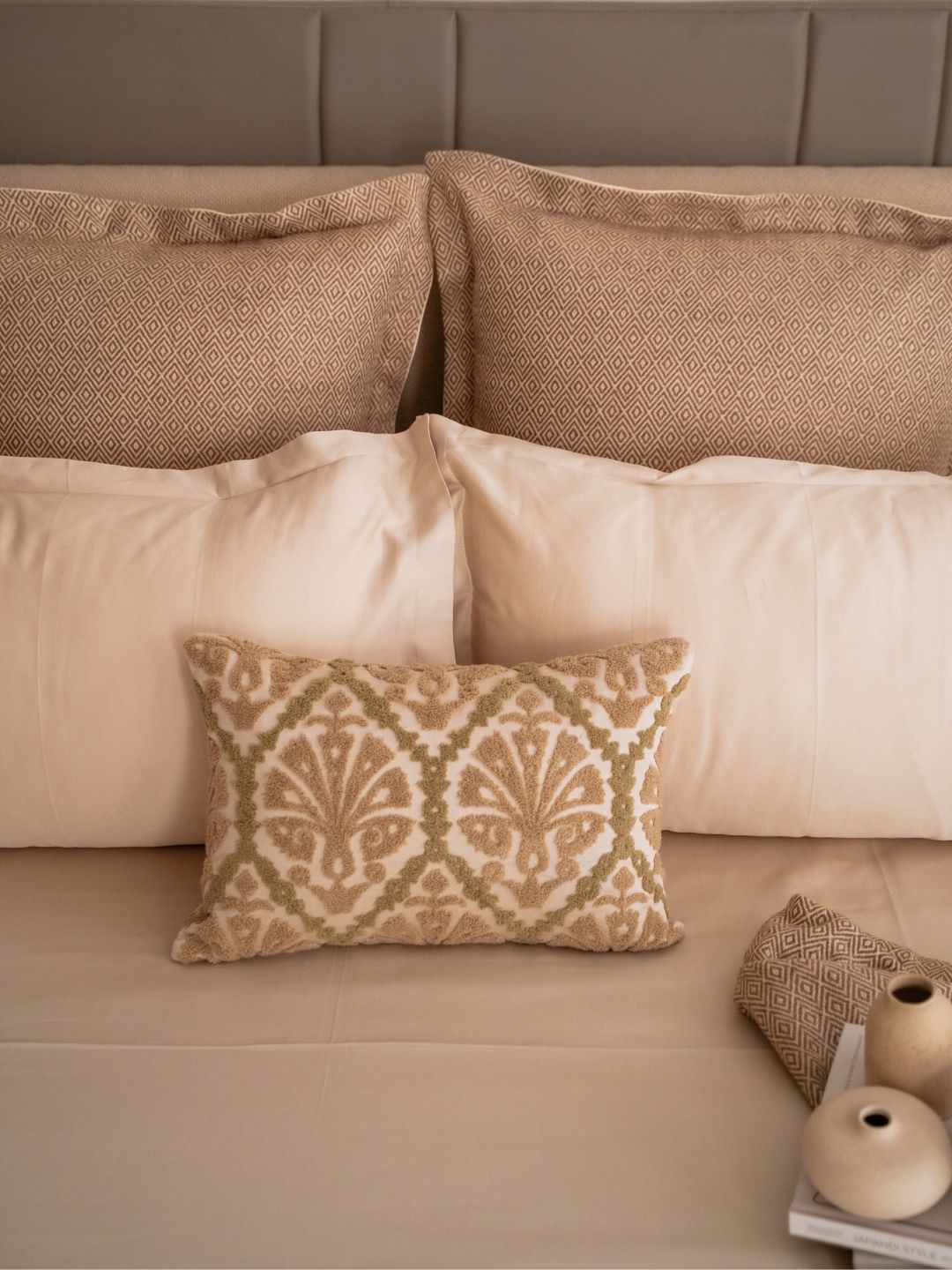 Bedroom scene with oats beige bedsheet set