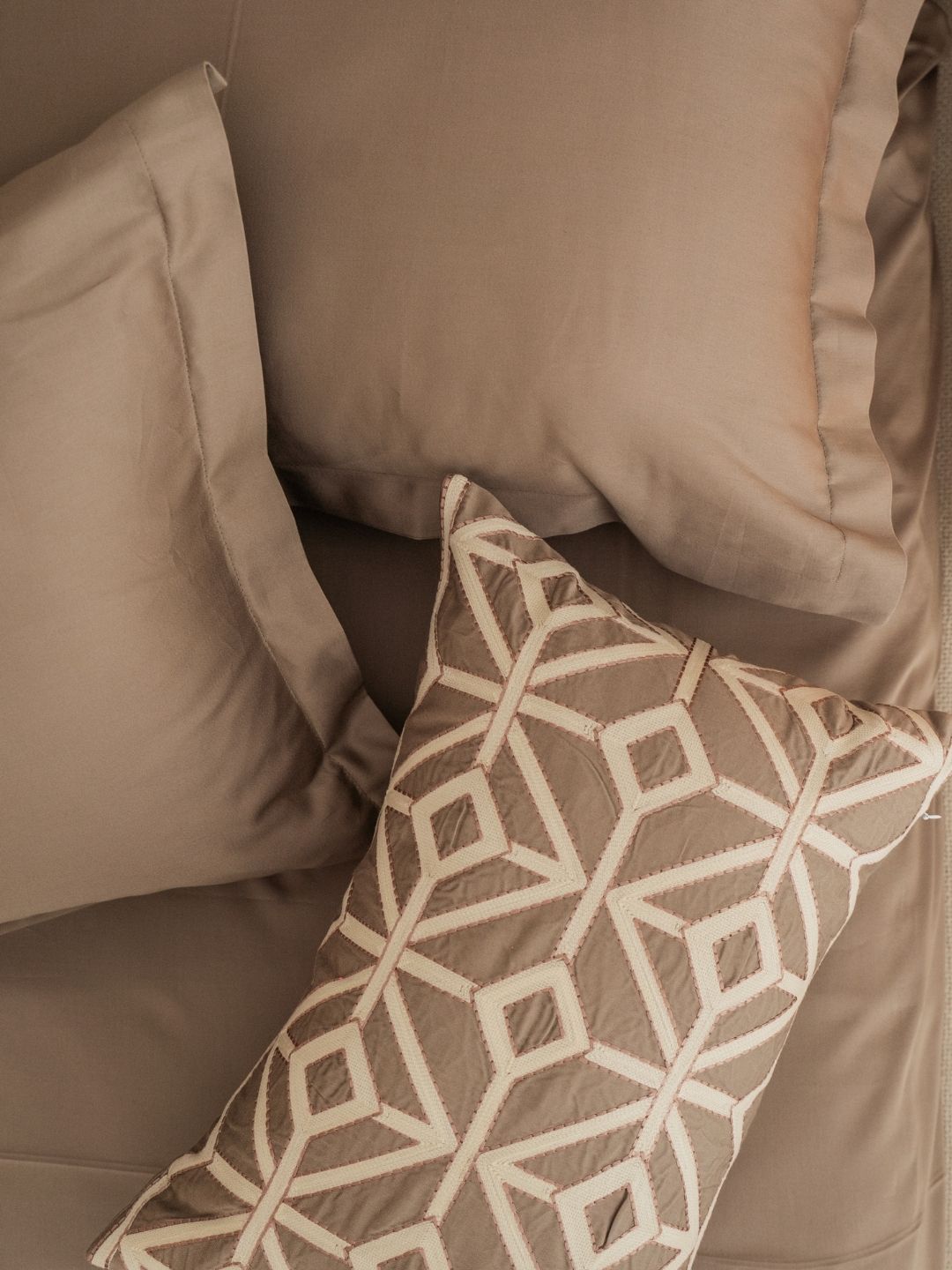 Full bed styled with Azure mocha Treasure bedsheet set