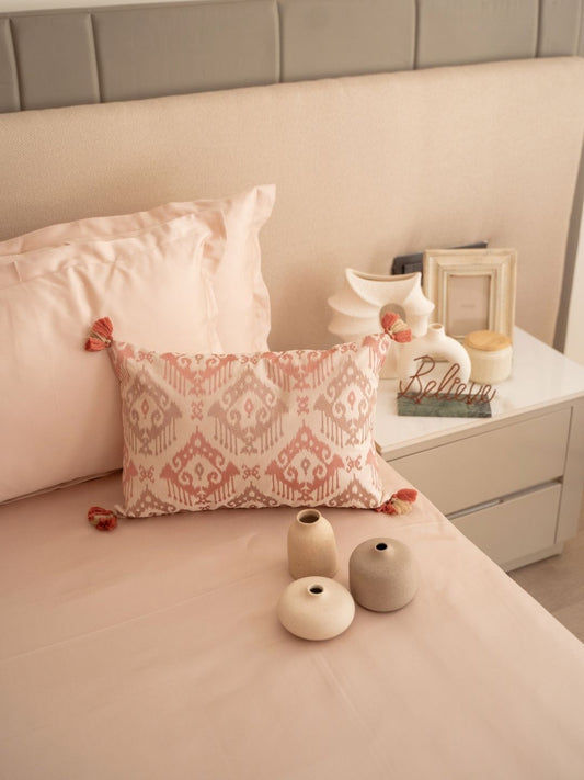 Buff colored bedsheet set styled on a bed