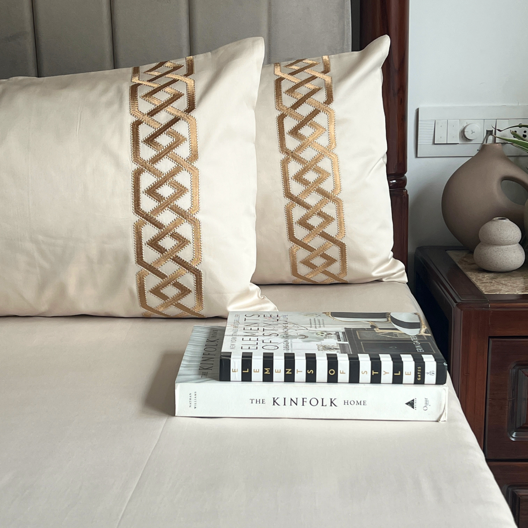 Austin oats beige bedsheet folded showing embroidery