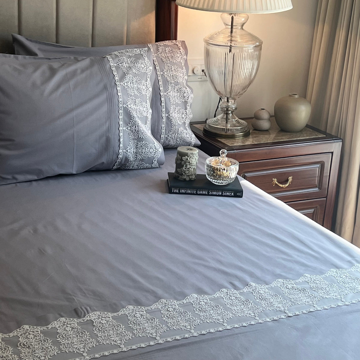 Full bed styled with elephant grey Chantilly bedsheet set