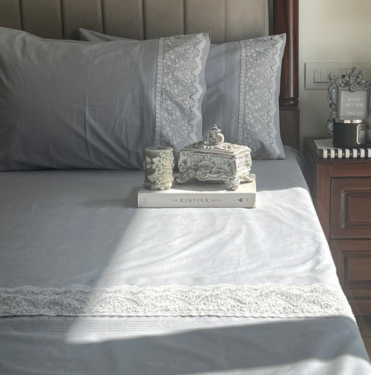 Chantilly slate bedsheet set styled on bed