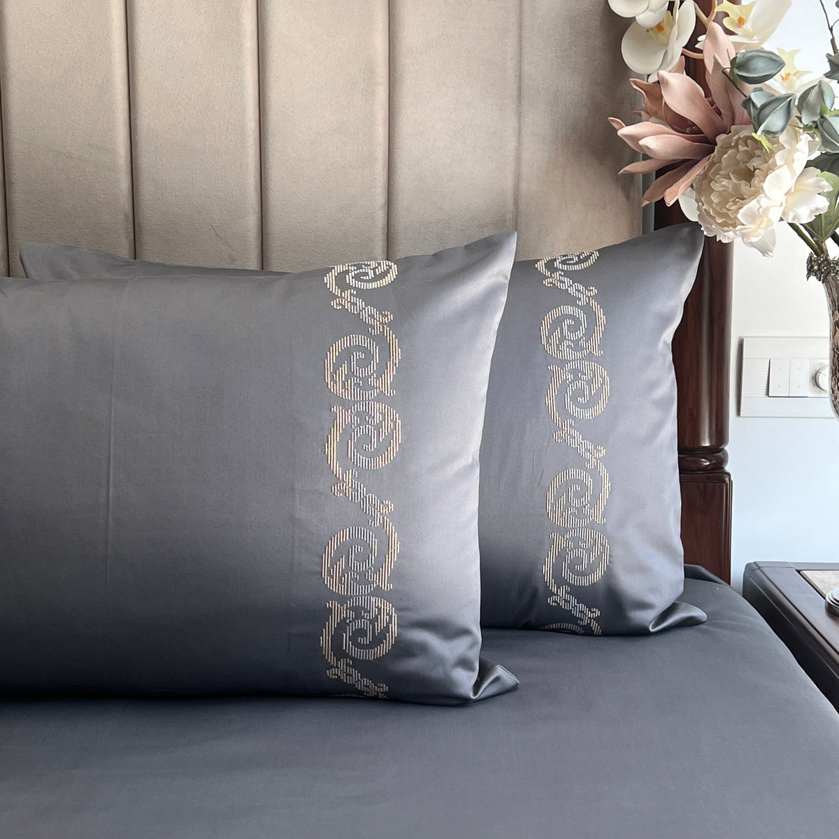 Titanium grey bedsheet set styled on a bed