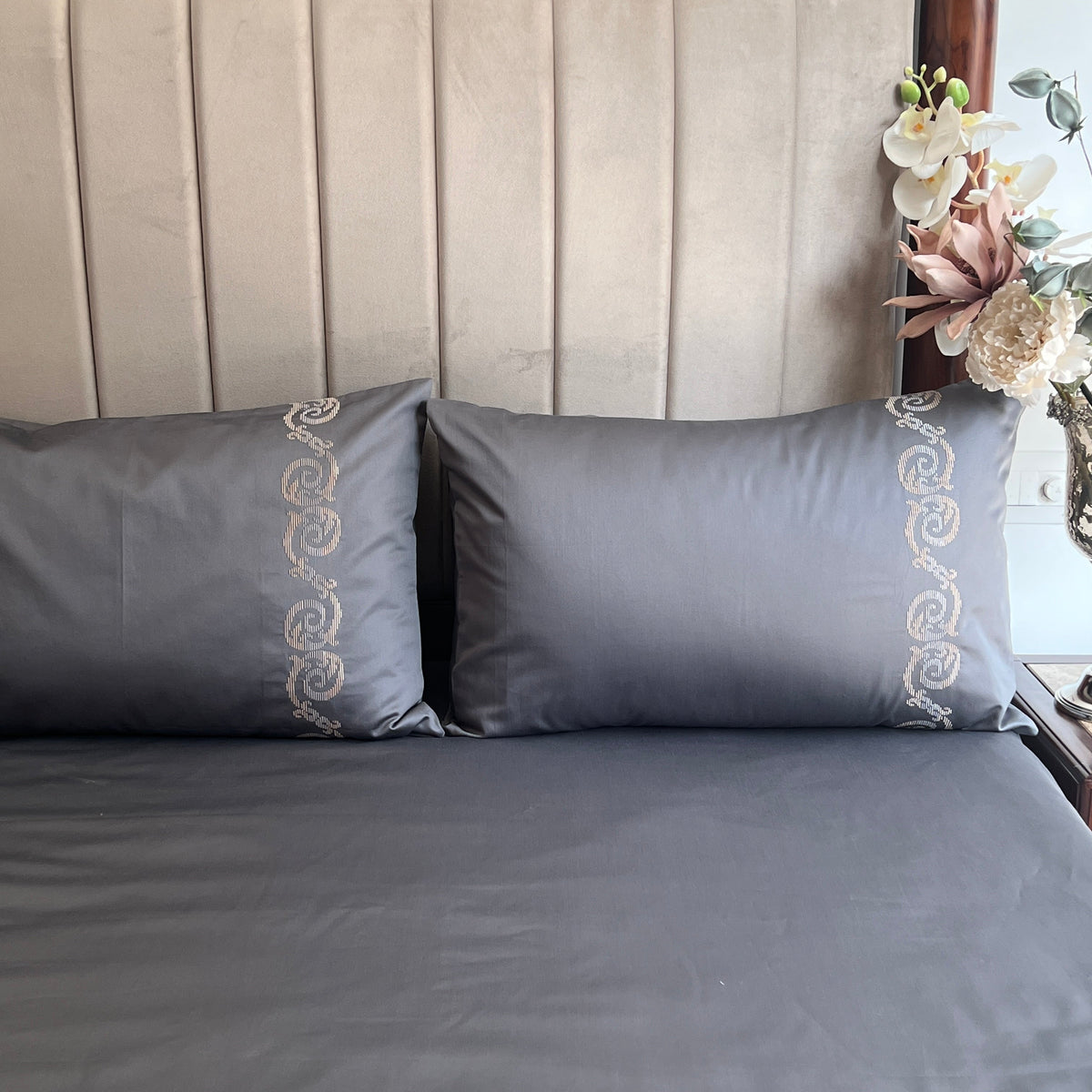 Flat lay of the titanium grey bedsheet and pillow covers