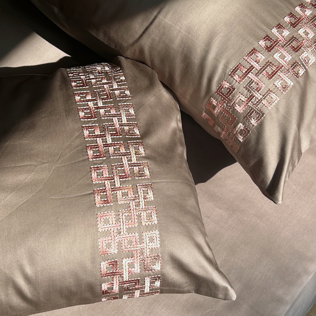 Evara taupe bedsheet set styled on bed