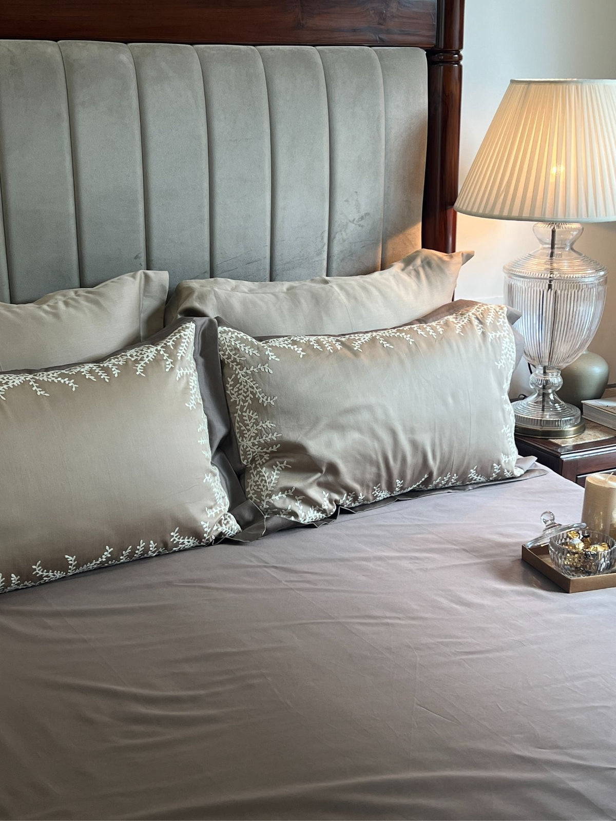 Faith sand taupe bedsheet folded with pillow covers