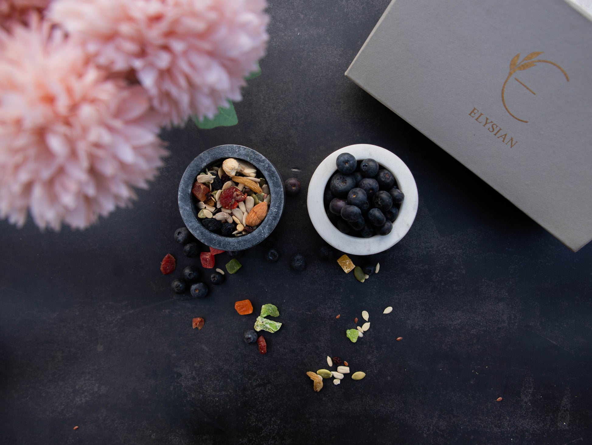 Marble condiment bowls with nuts and blueberries