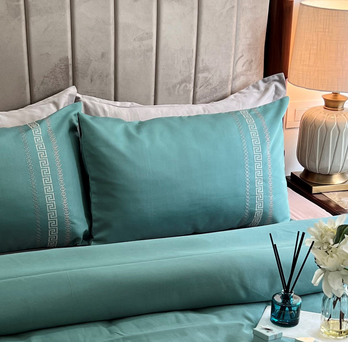 Turquoise Lucas Syona bedsheet set styled on bed