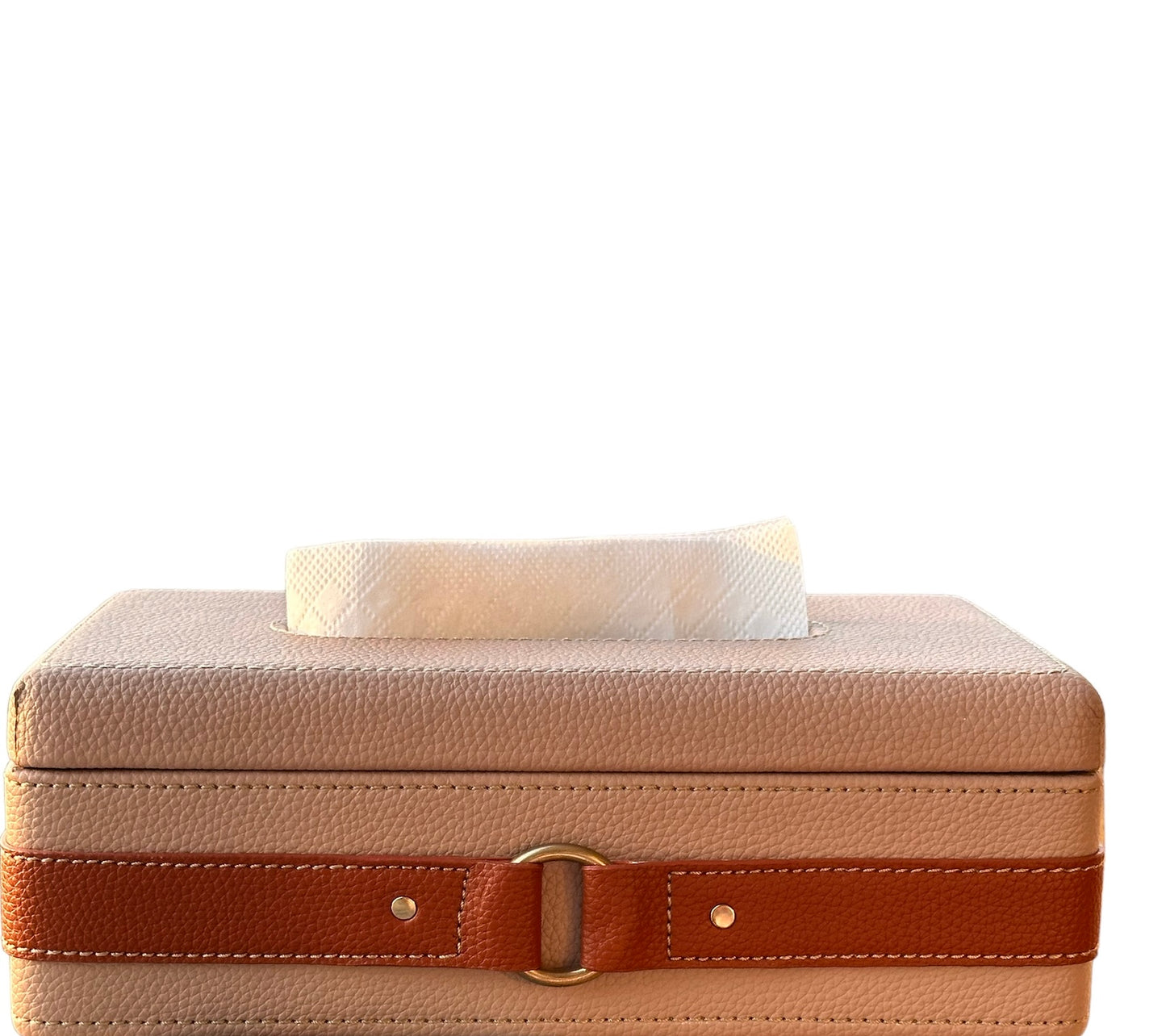 Beige leather tissue box with decorative strap detail.