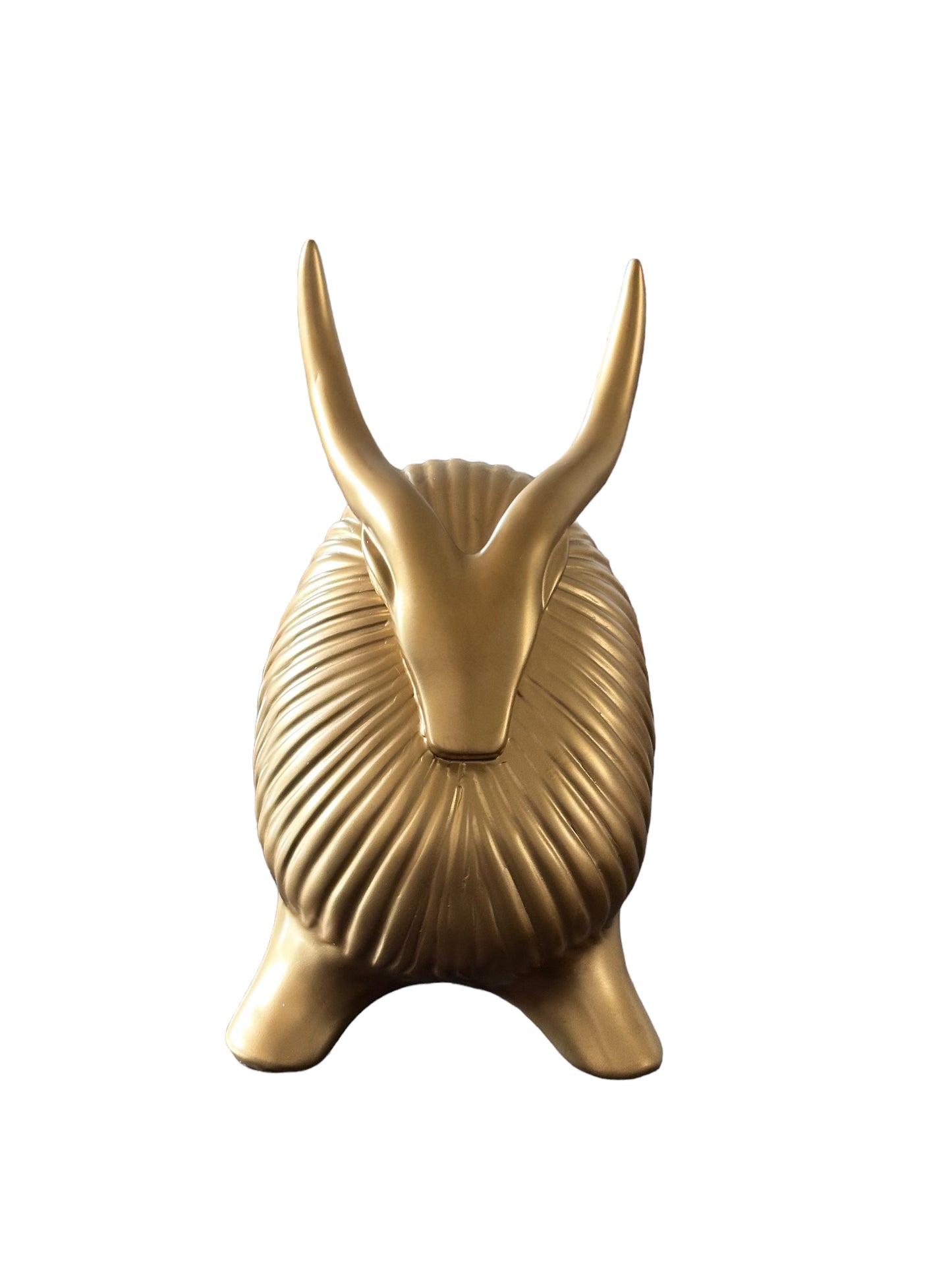 Stylish gold yak decor with detailed texture.