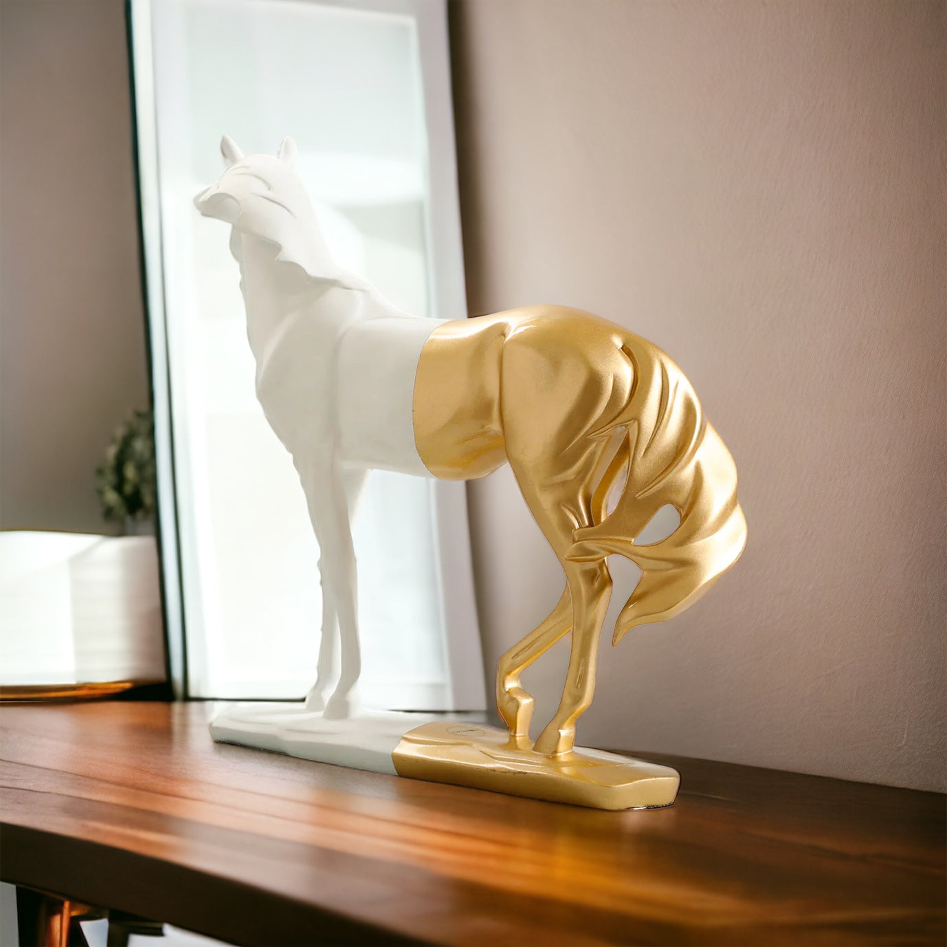 Elegant white and gold Roman horse sculpture on display