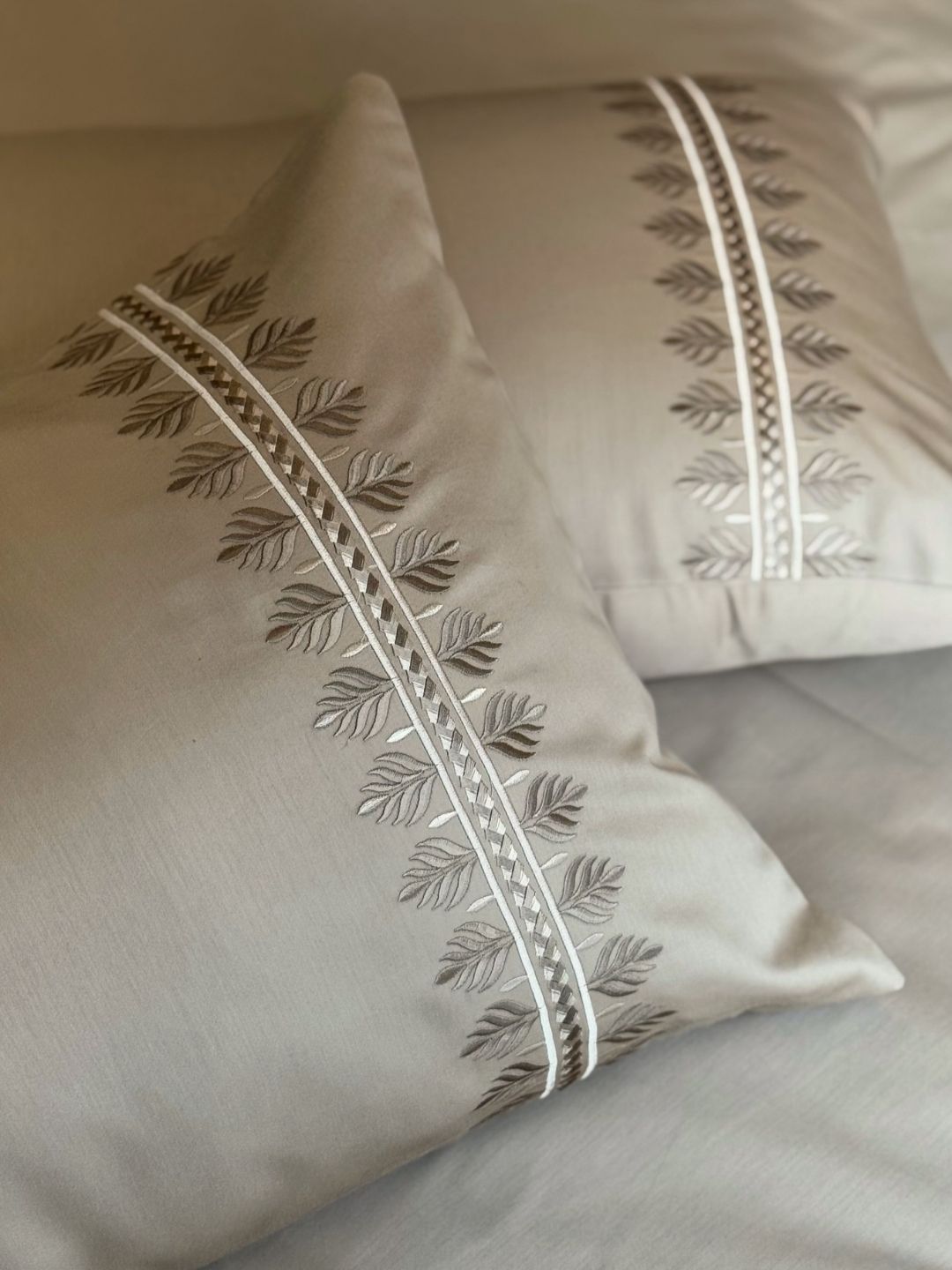 Close-up of sand embroidered pillow cover