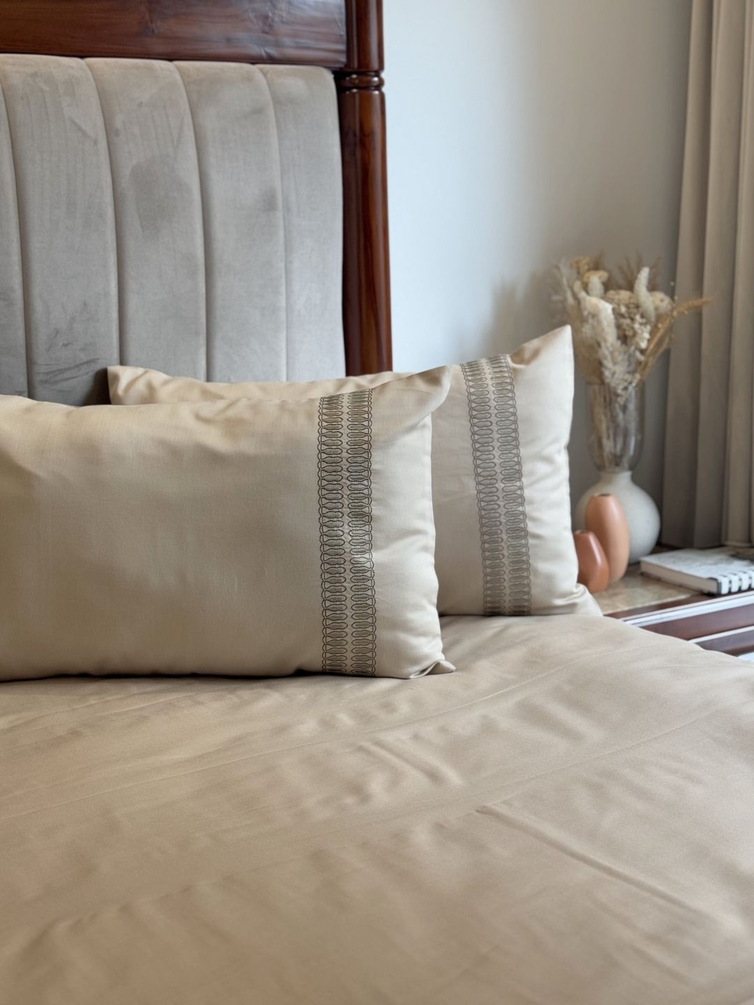 Ella sand bedsheet folded showing fabric texture