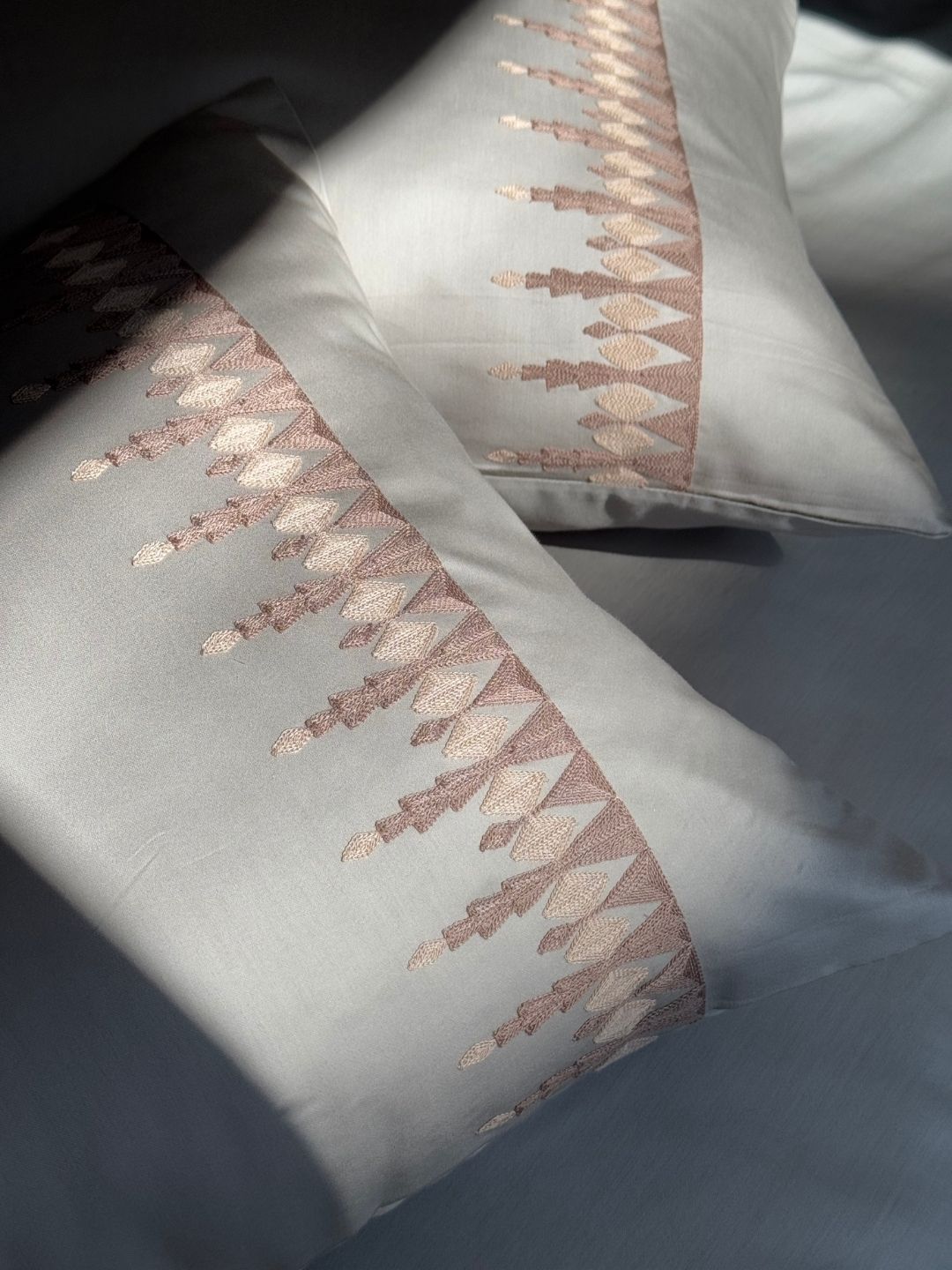 Ivy beige bedsheet folded showing fabric detail