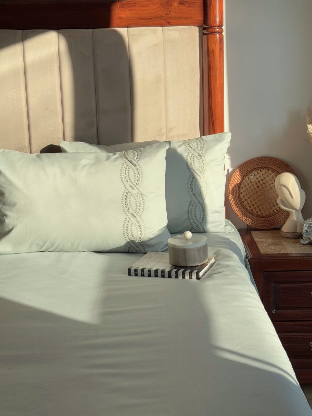 Lily sage green bedsheet folded showing fabric detail