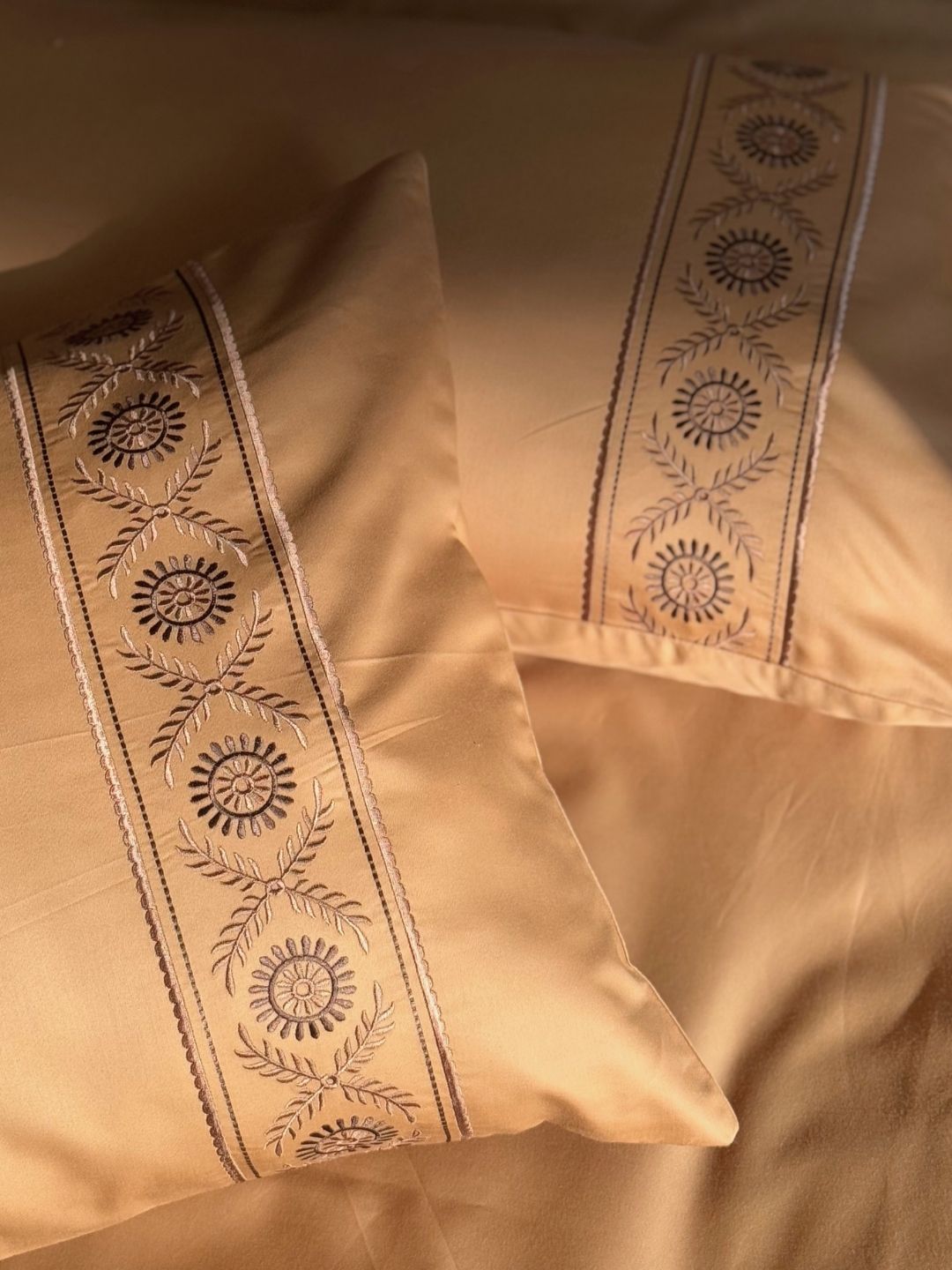 Flat lay of honey mustard bedsheet and pillow covers