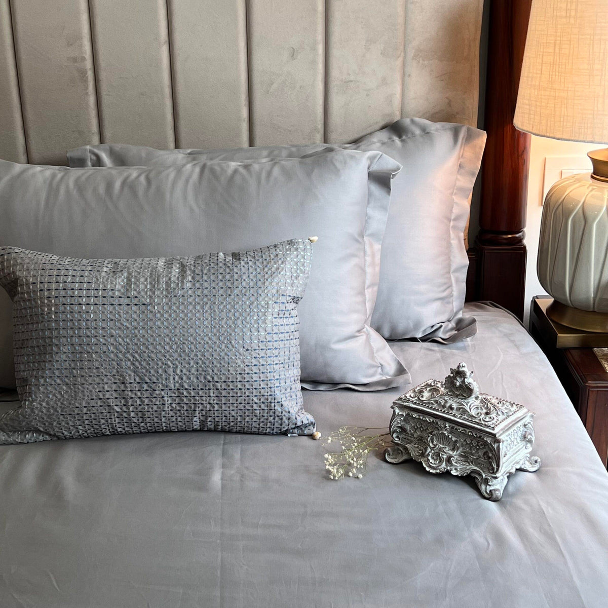Folded stack of the slate bedsheet and pillow covers