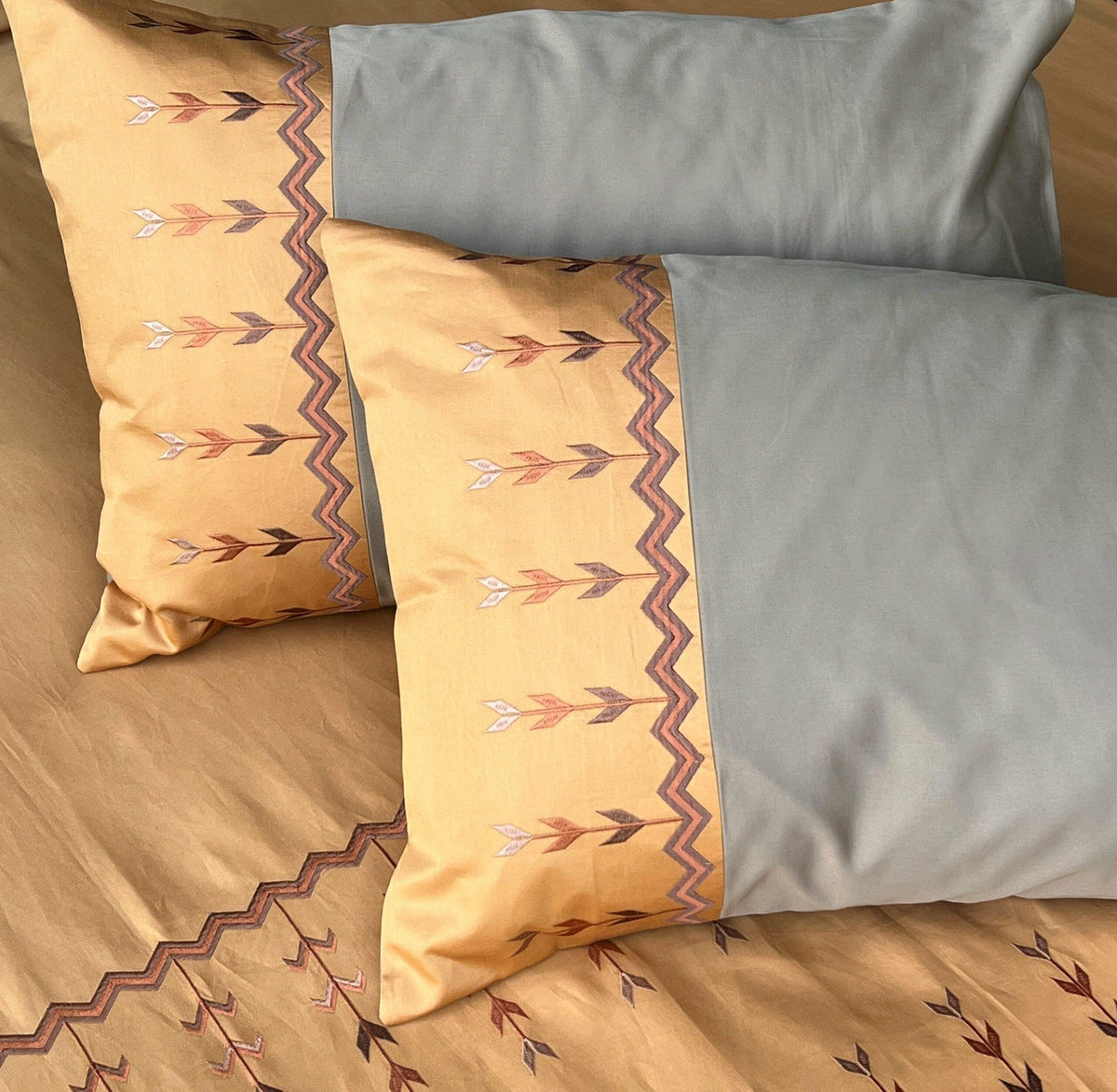 Close-up of embroidered leaf pattern pillow cover