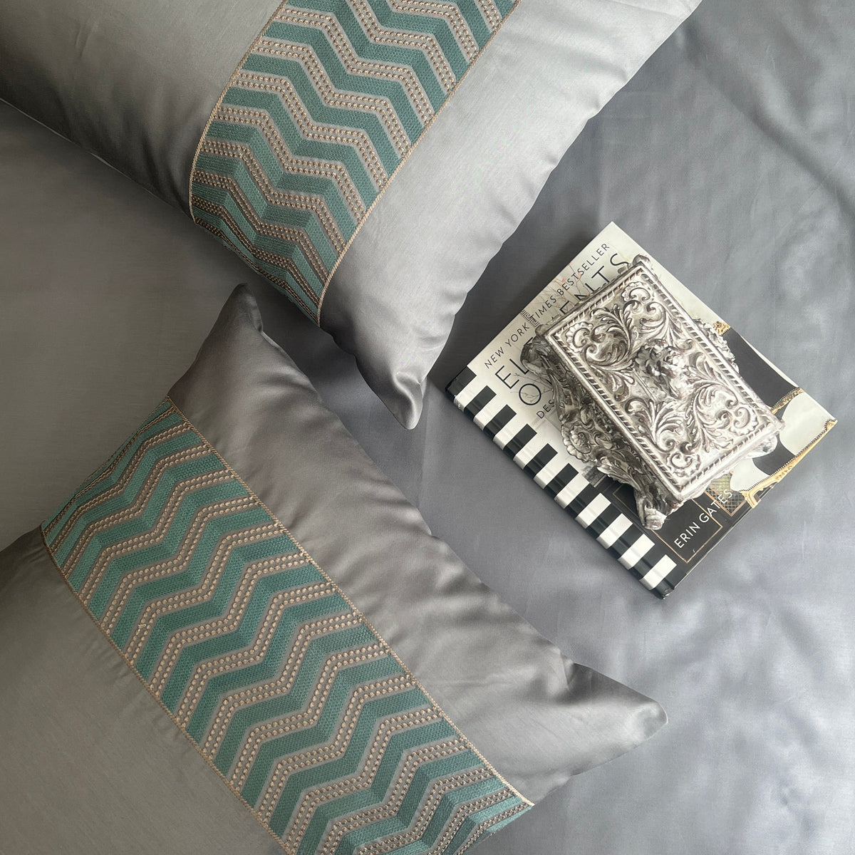 Close-up of chevron pattern embroidered pillow cover