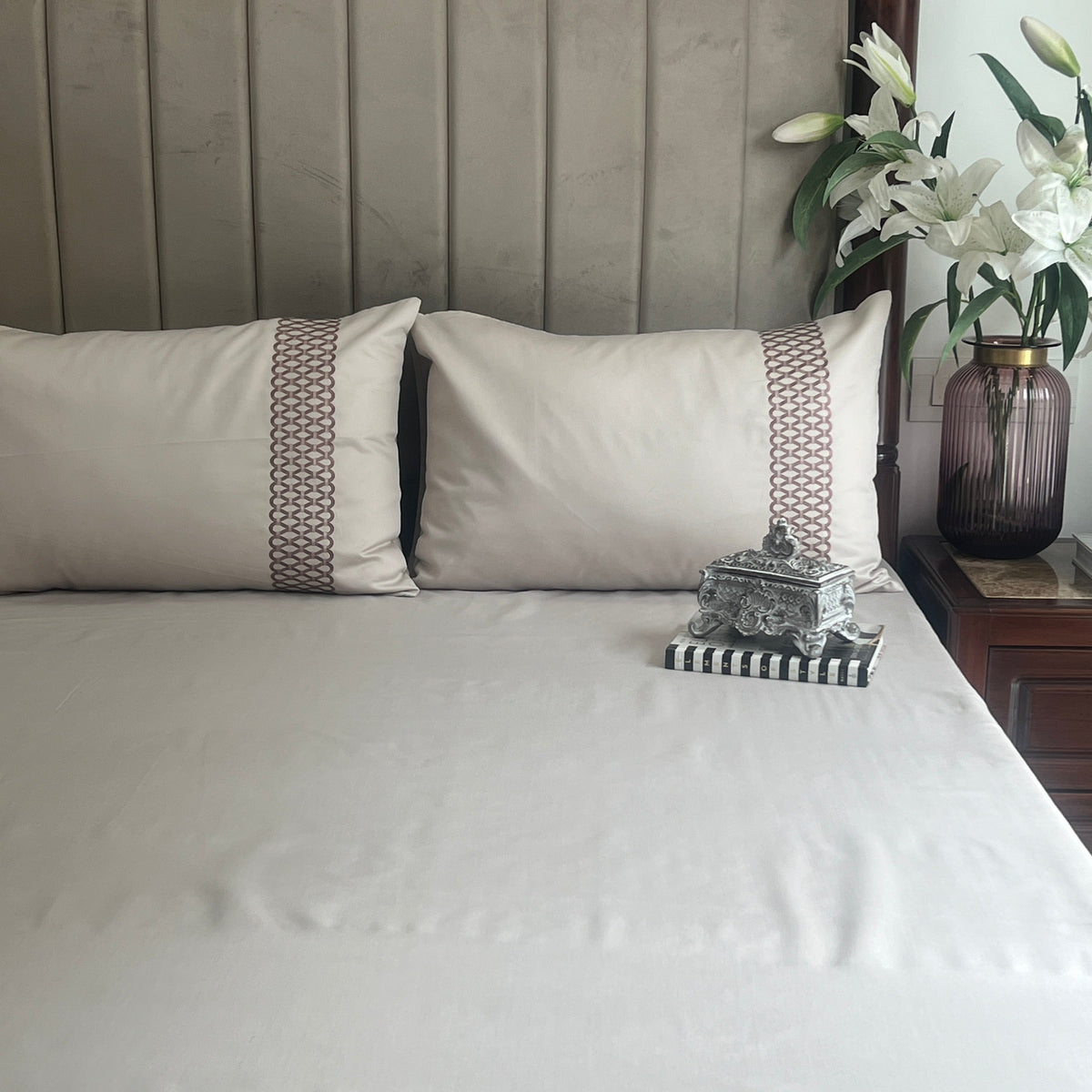 Ivory Syona bedsheet folded showing fabric texture