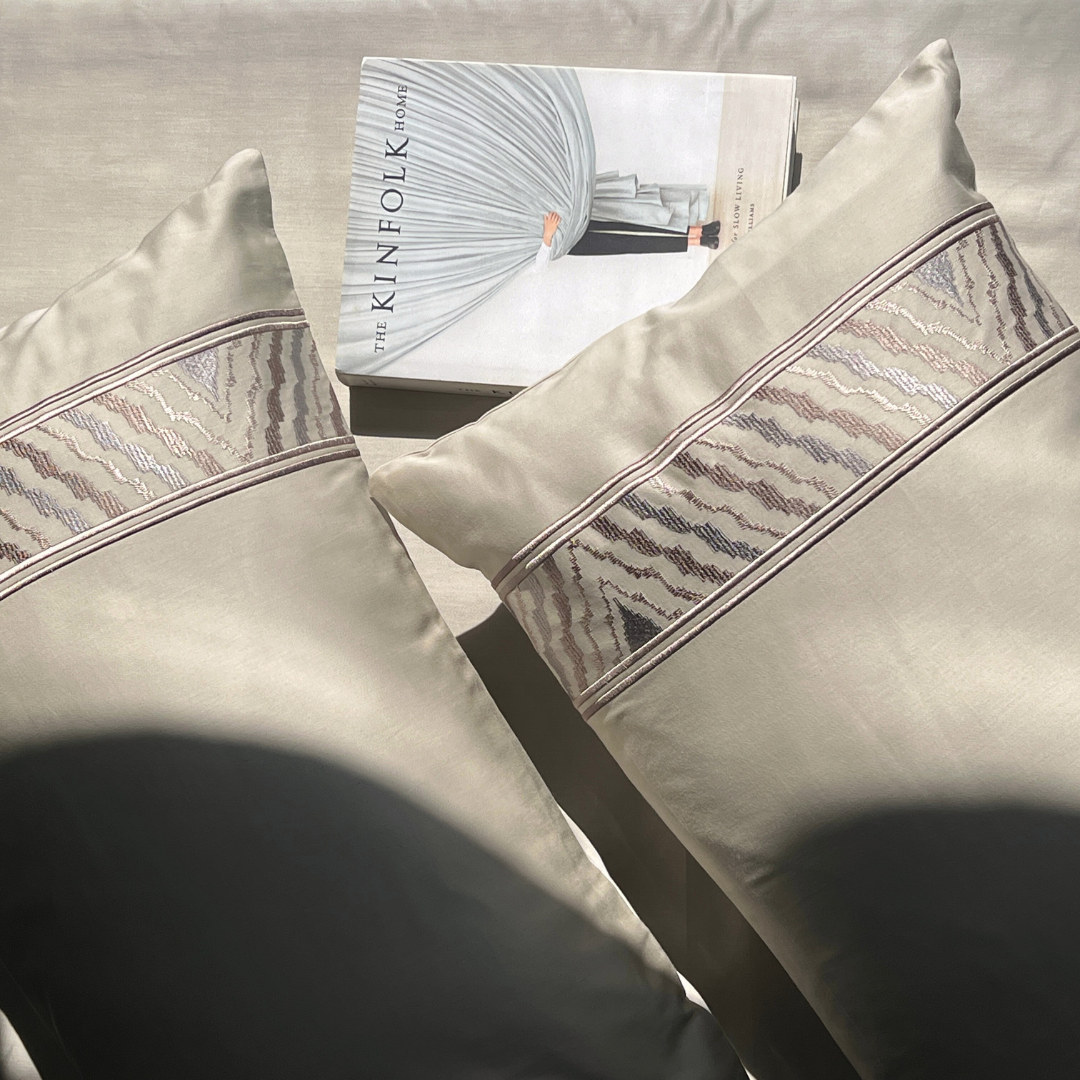 Zurich beige bedsheet folded showing fabric detail