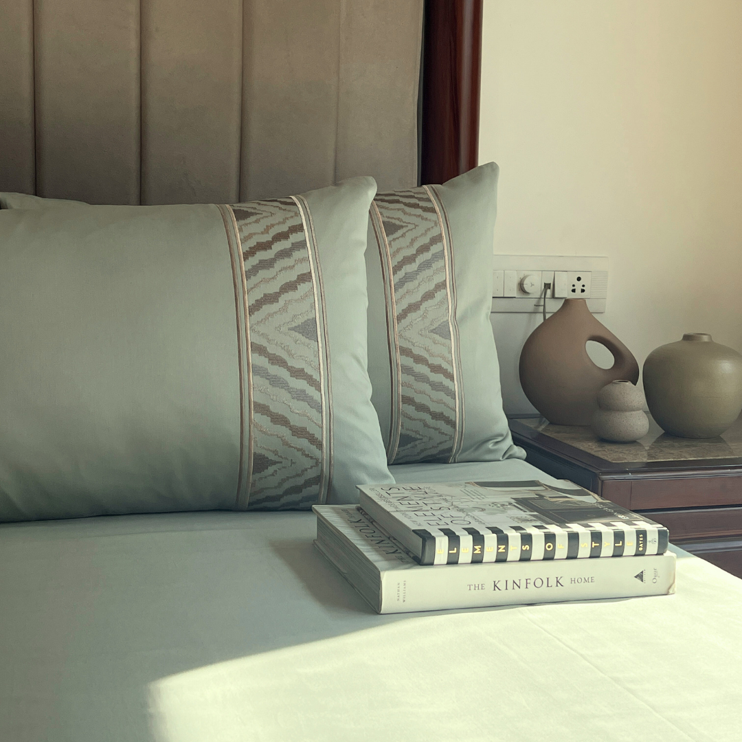 Zurich sage green bedsheet set styled on bed