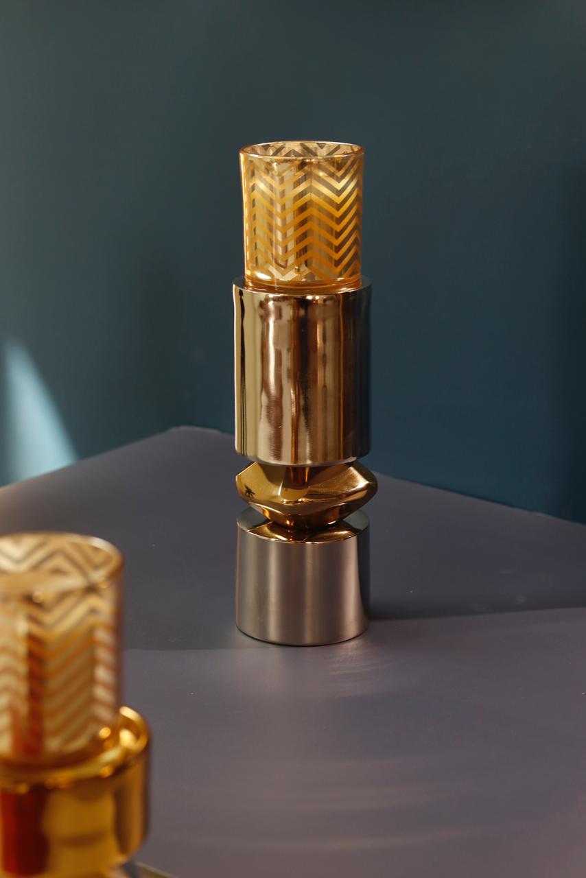 Elegant gold nickel metal candle stand with geometric details.