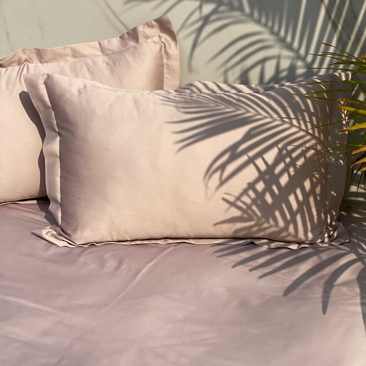 Buff beige colored bedsheet and pillow covers set laid out